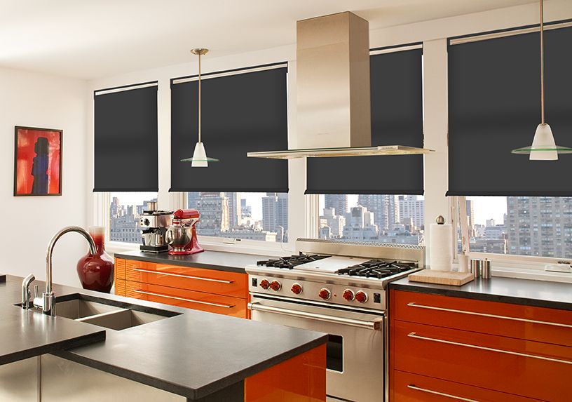 Motorized roller shades
